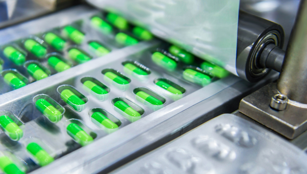 Green,Capsule,Medicine,Pill,Production,Line,,Industrial,Pharmaceutical,Concept